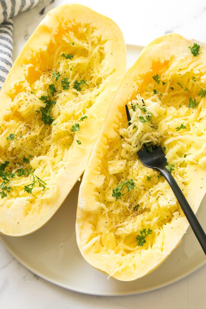 Open spaghetti squash with fork