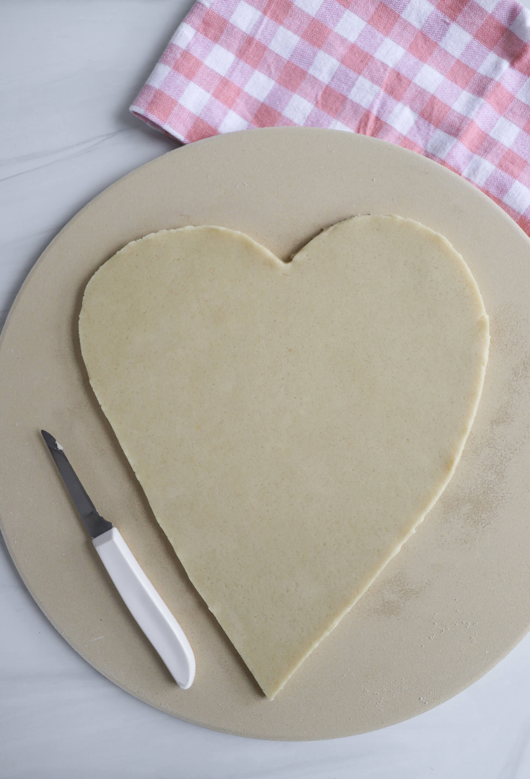 Making a heart-shaped pizza Making a heart-shaped pizza