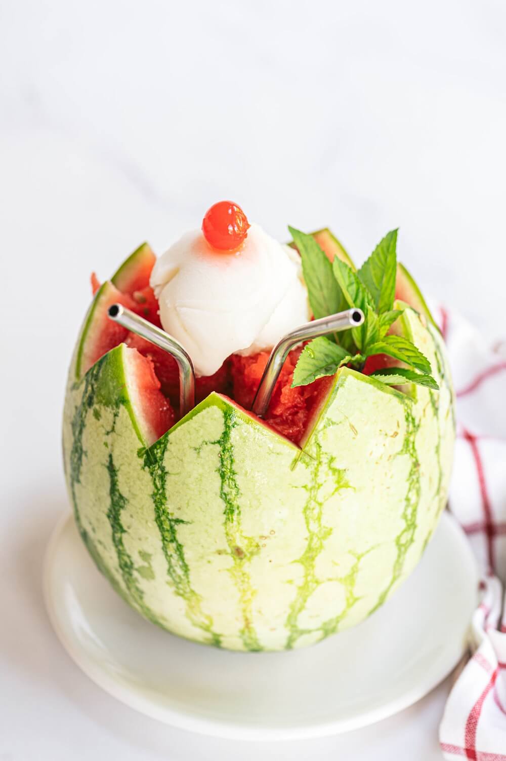 A sorbet float using a mini watermelon A sorbet float using a mini watermelon