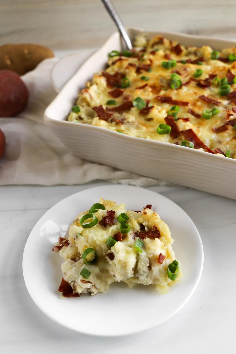 A scrumptious slice of Twice Baked Potato Casserole A scrumptious slice of Twice Baked Potato Casserole