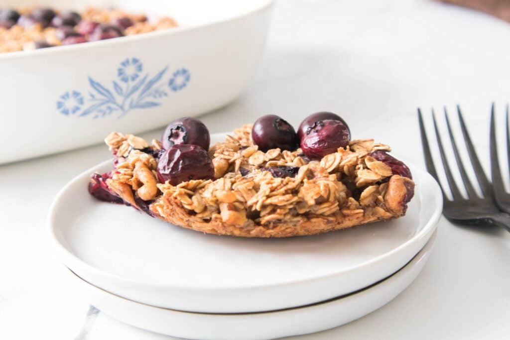 Blueberry Baked Oatmeal Blueberry Baked Oatmeal on a white plate