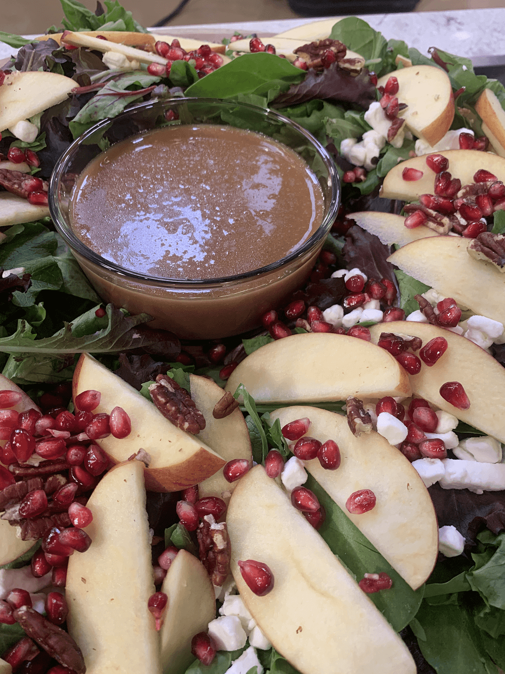 Envy apples, pomegranate seeds, and a tasty Balsamic dressing Envy apples, pomegranate seeds, and a tasty Balsamic dressing