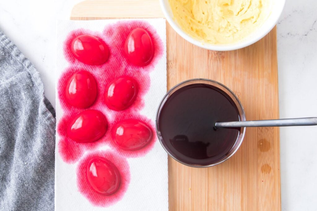 eggs whites after being dyed drying on a towel