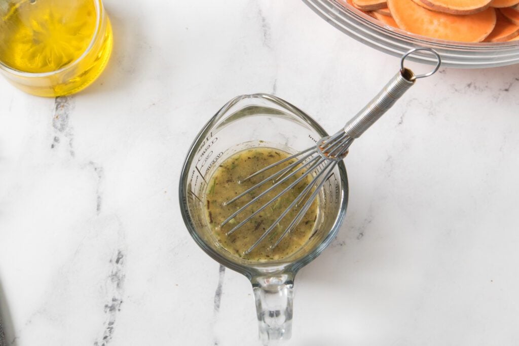 Whisking the butter dressing