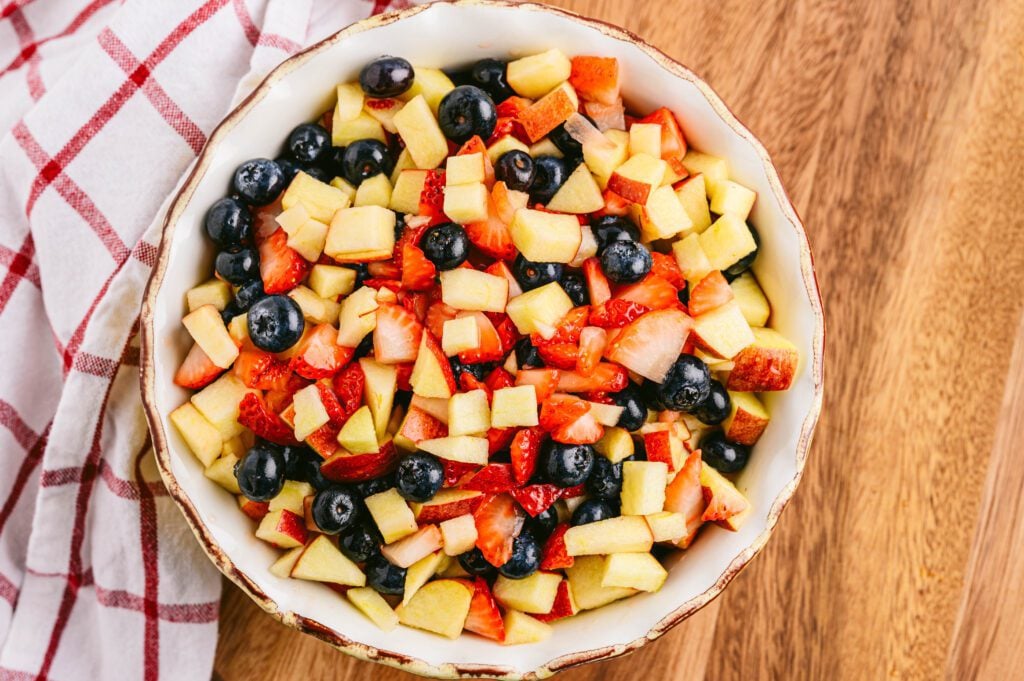 overhead view of apple berry fruit salsa in a bowl