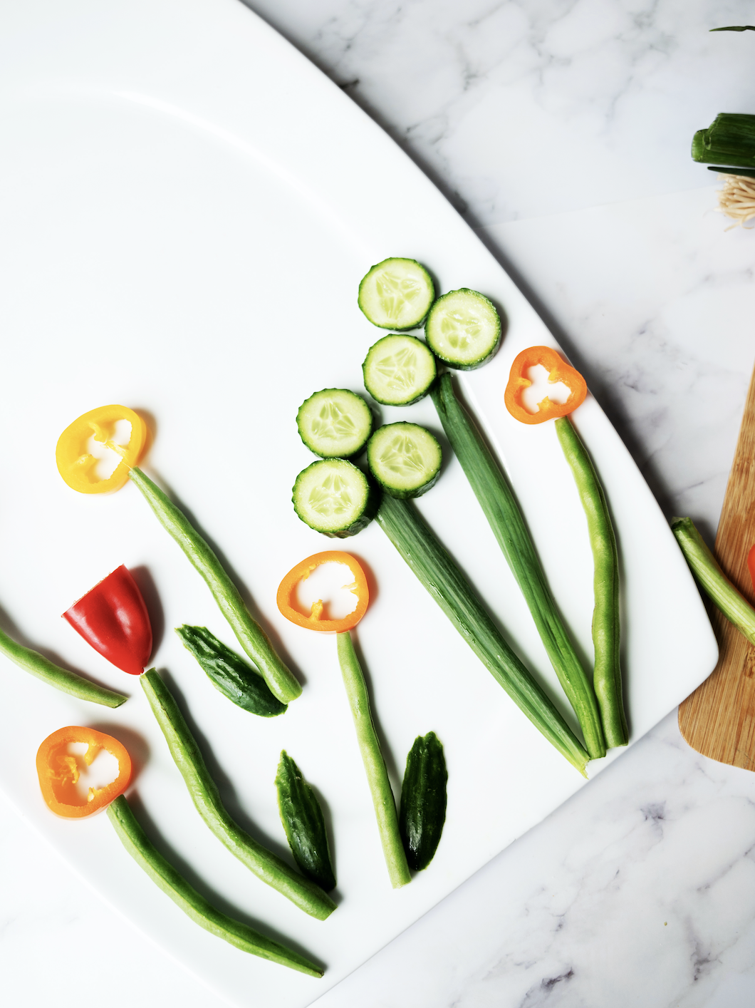 Veggie flowers on the bottom the plate