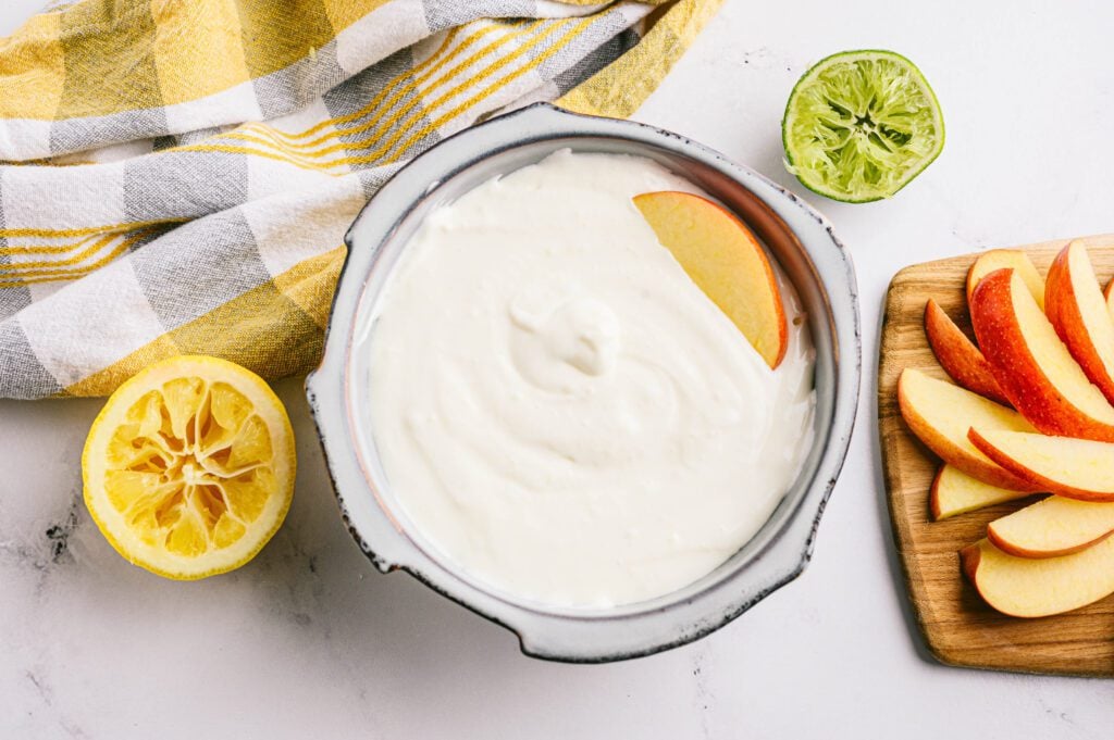 fruit dip with fruit around it