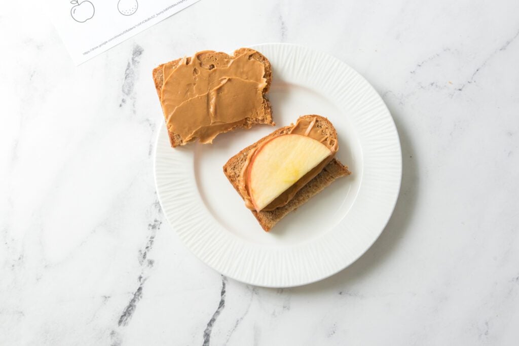 bread with apple on a white plate