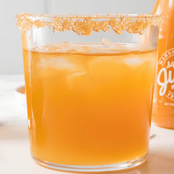 Mandarin Cocktail with Squeezed Juice in background