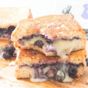 bite taken out of blueberry grilled cheese sandwich