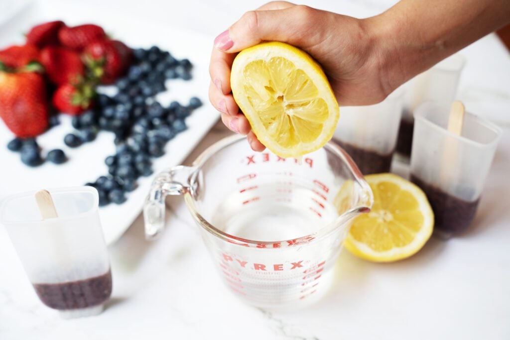 lemon juice into cup of water