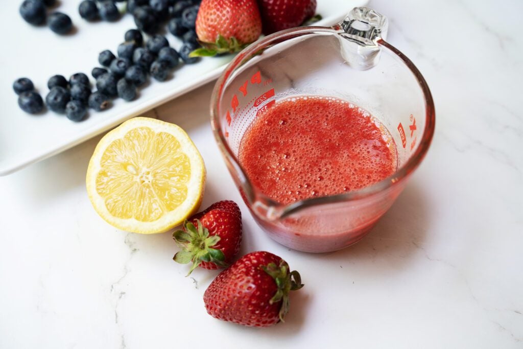 strawberry mixture in measuring cup