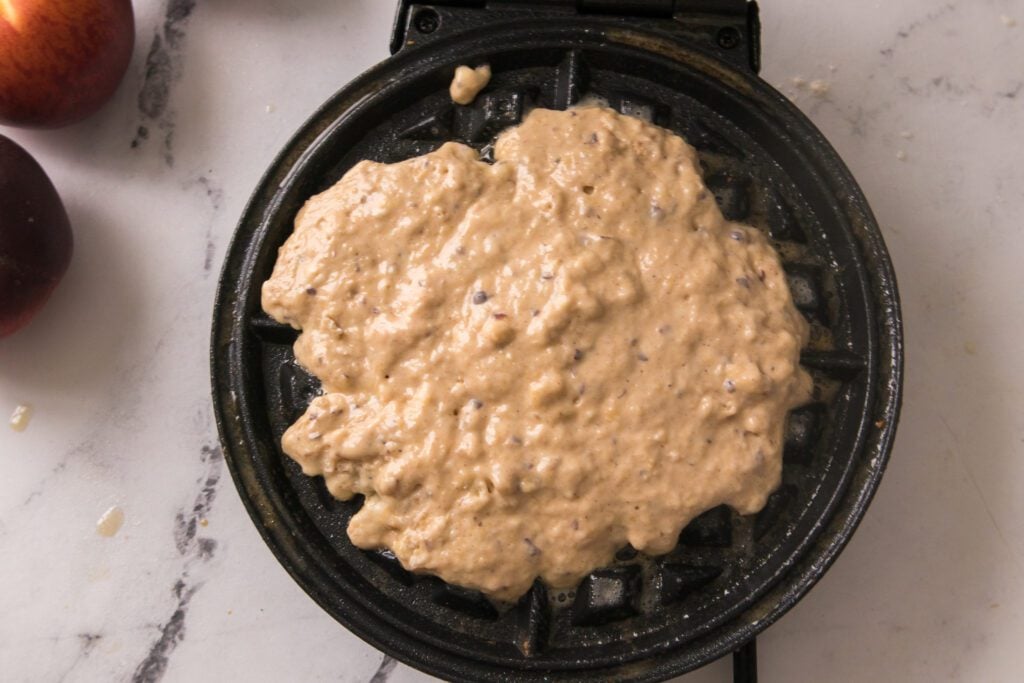 waffle mixture in waffle maker