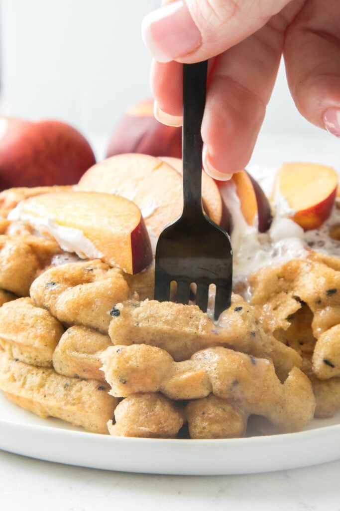 Fork into peaches and cream waffles