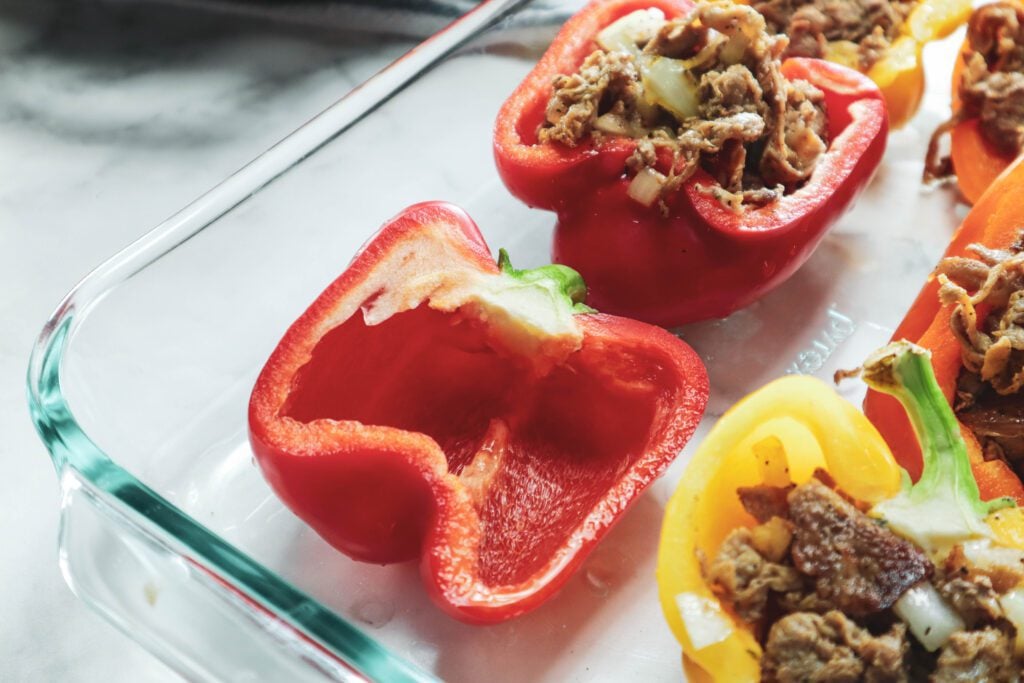 Add in mixture to bell peppers
