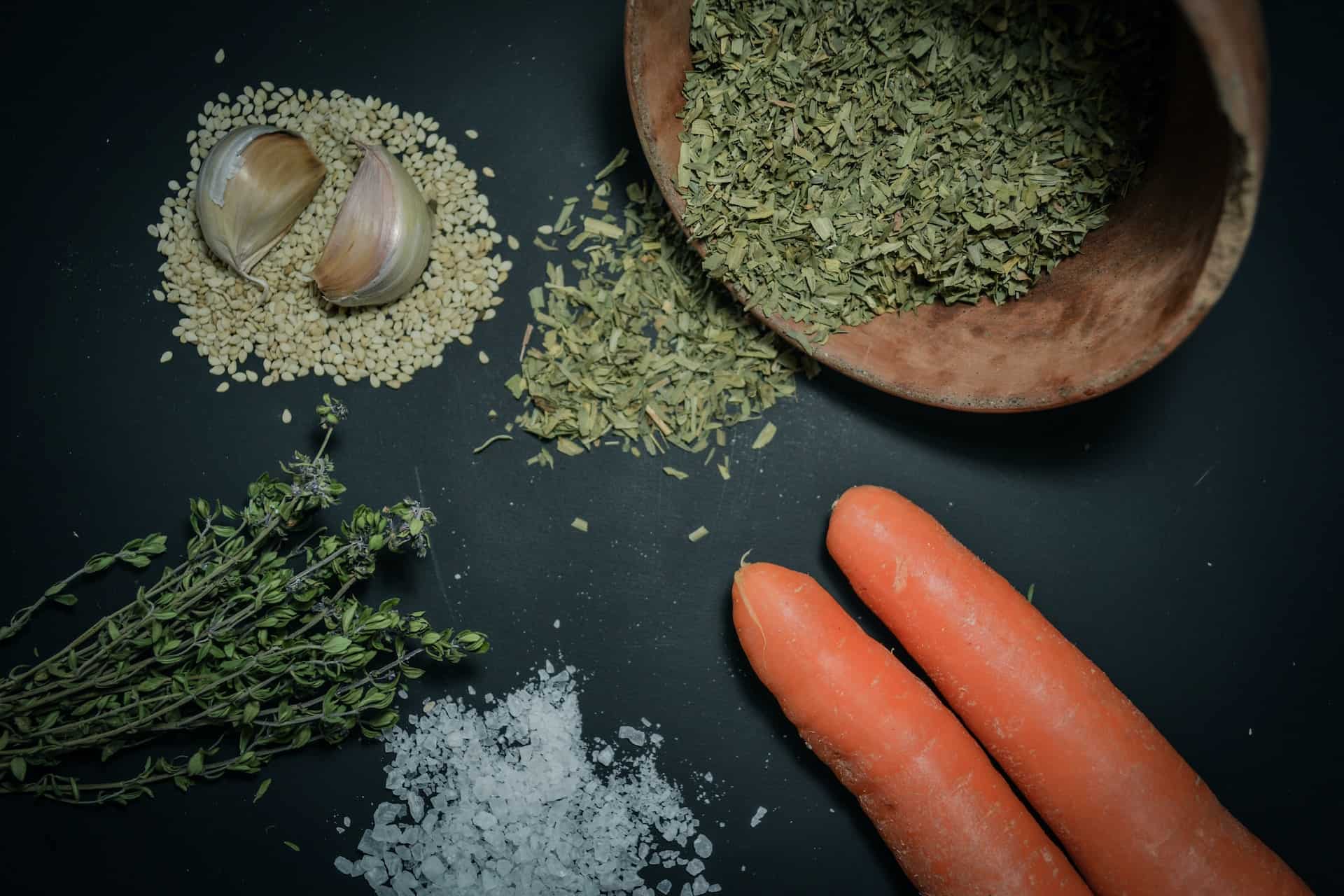 a mixture of herbs along with carrots