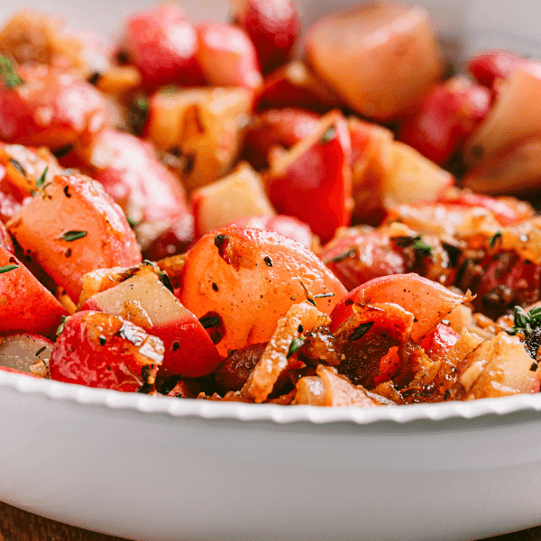 Sautรฉed Radishes with Bacon in white bowl