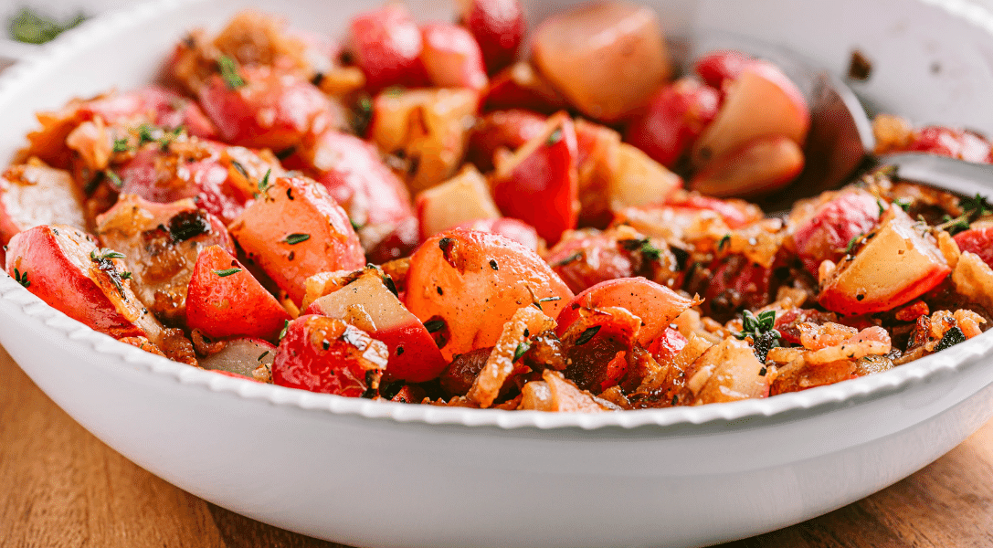 Sautéed Radishes with Bacon in white bowl