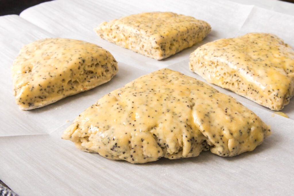 lemon scones on baking sheet with egg wash