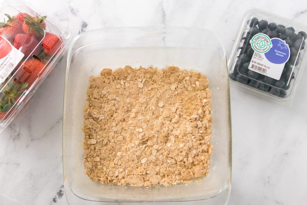 oat crumble crust in greased 9x9 baking dish