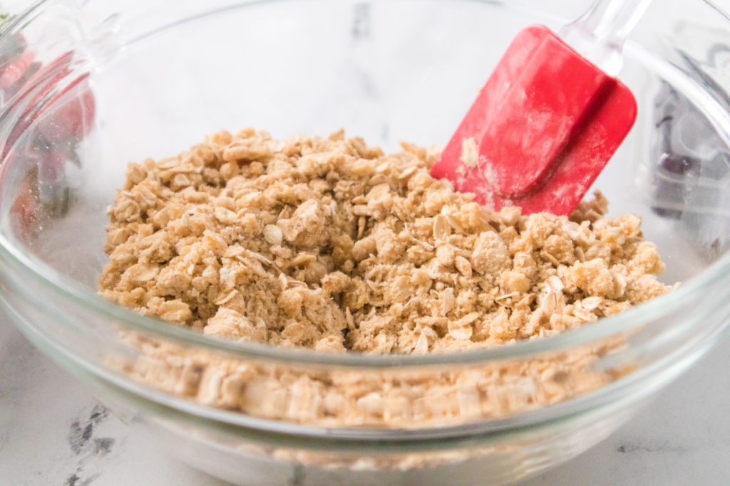 Stirring mixture into clumps