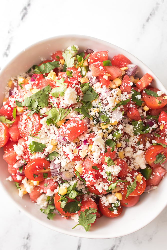close up of tomato and watermelon salad