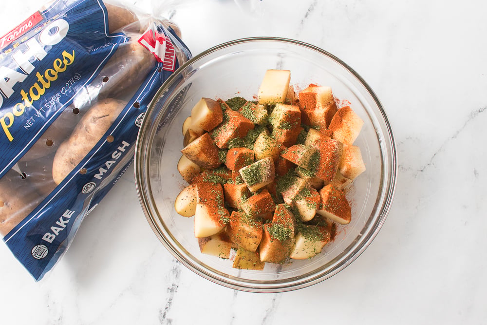 glass bowl with wada farms potatoes and seasonings