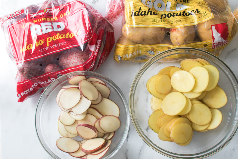 two glass bowls, one of wada farms red potatoes and the other gold potatoes