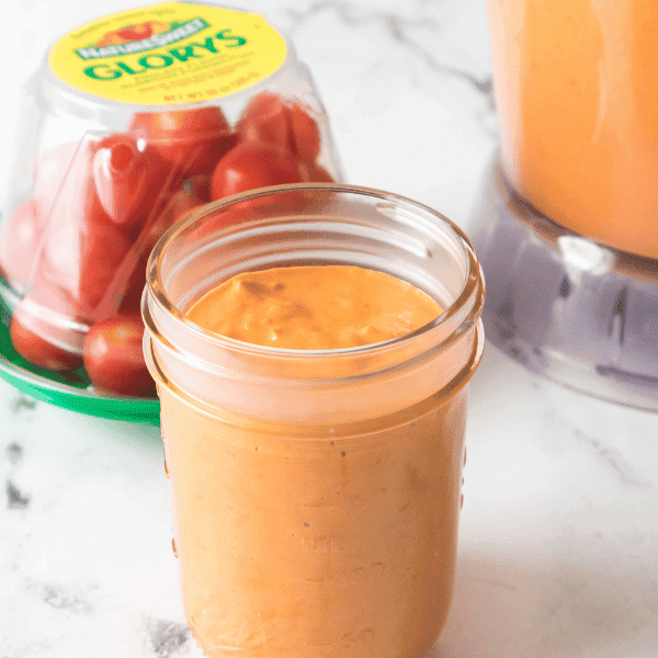 Roasted Tomato Aioli in jar with Glorys® in background