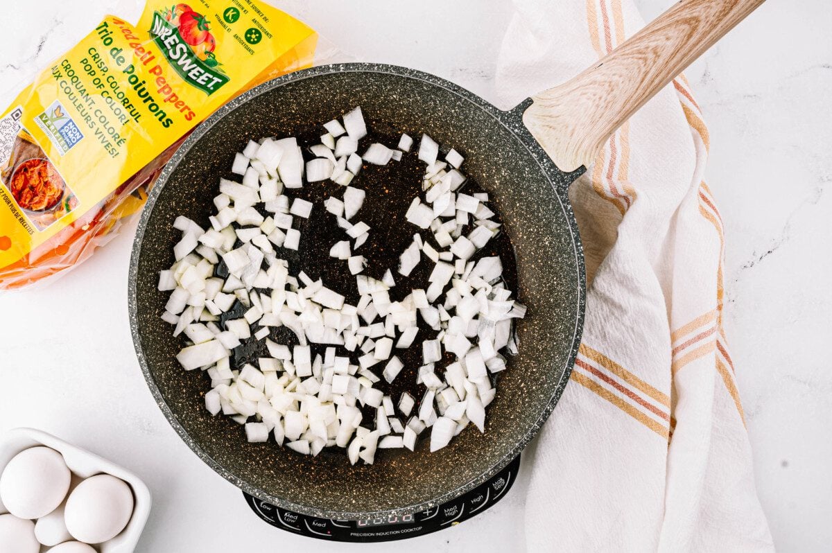 Cook onions in a skillet until translucent.