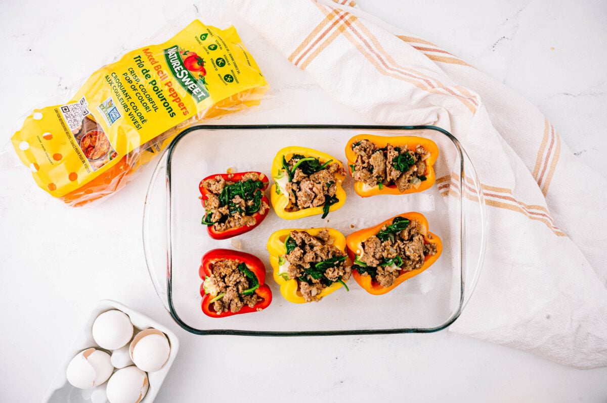 Spoon sausage mixture into each bell pepper.