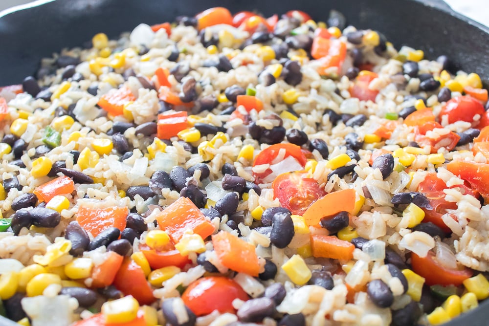 Southwestern Rice simmering in pan