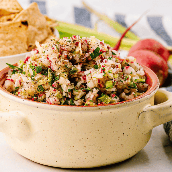 Radish salsa in dish with tortilla chips