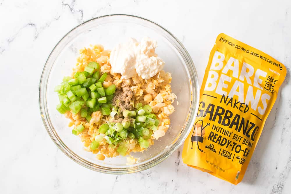 ingredients for chickpea salad in glass bowl