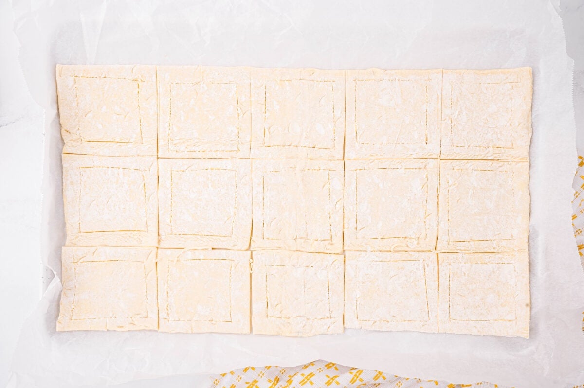puff pastry cut on parchment paper