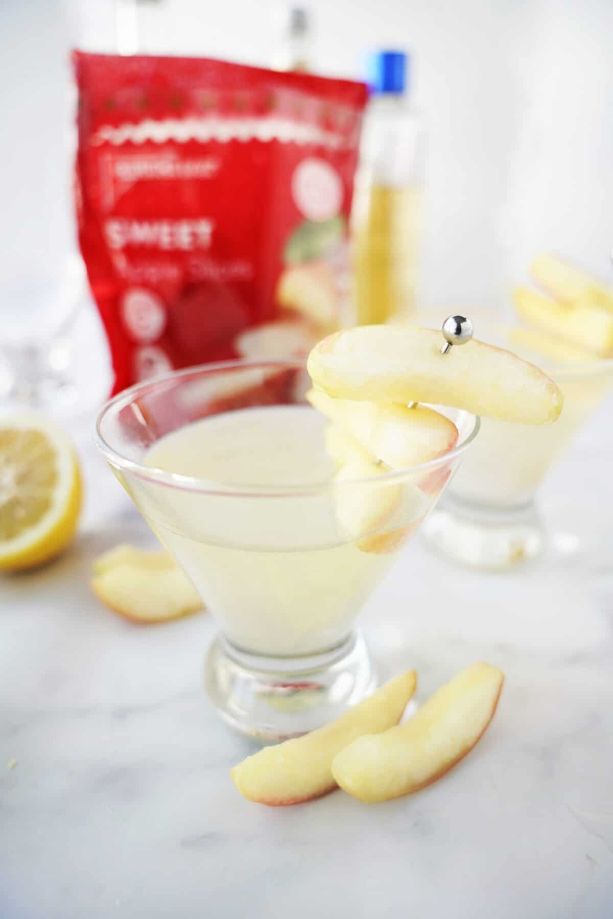 apple martini garnished with apple slices