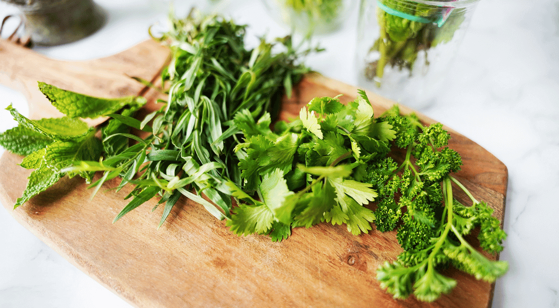fresh herbs on cutting board