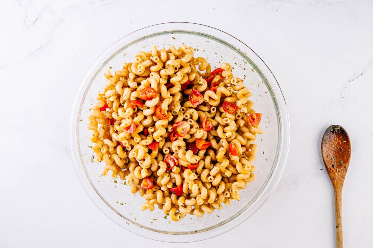 Toss the salad in the serving bowl.