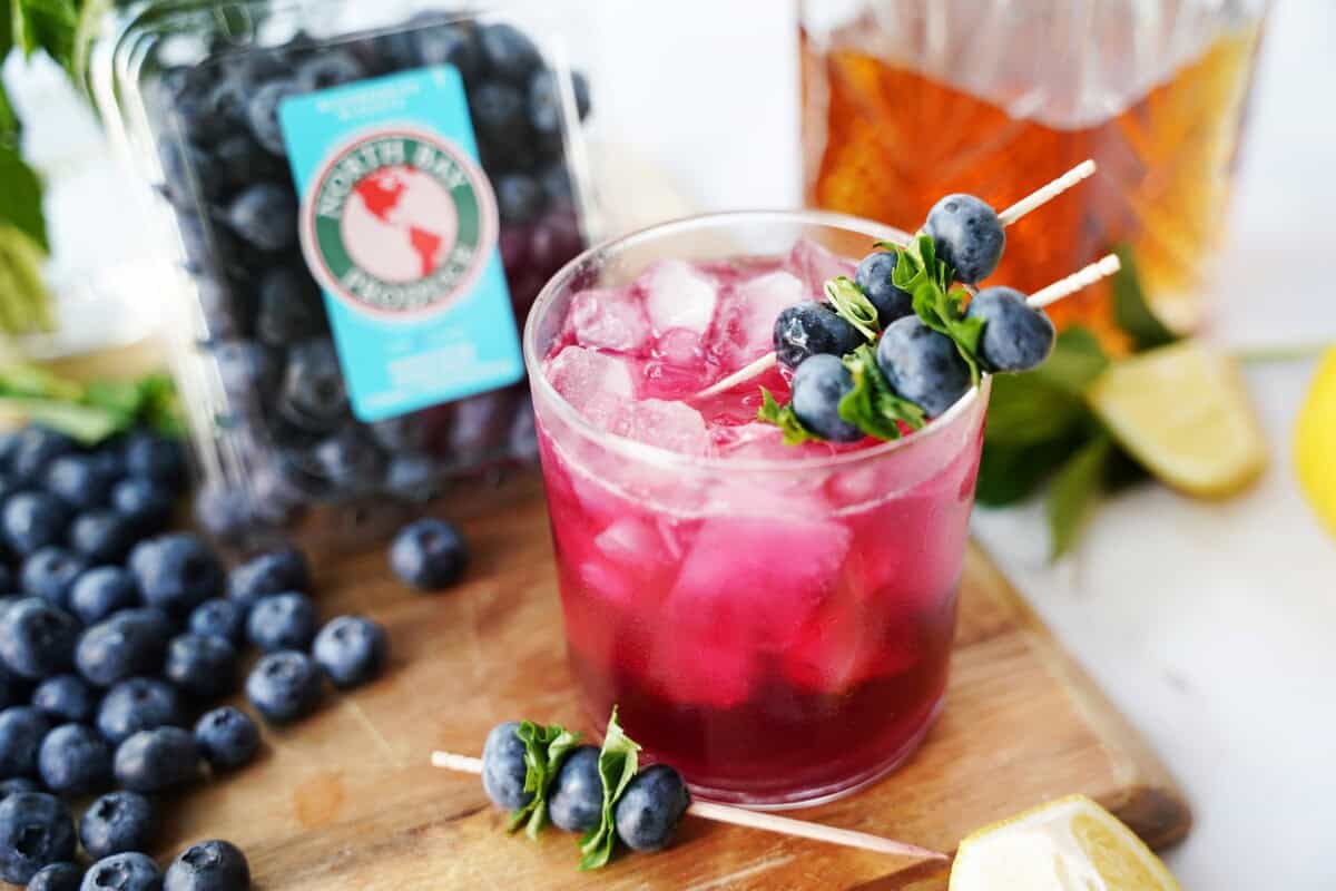 ingredients - blueberries, bourbon, tonic, and mint