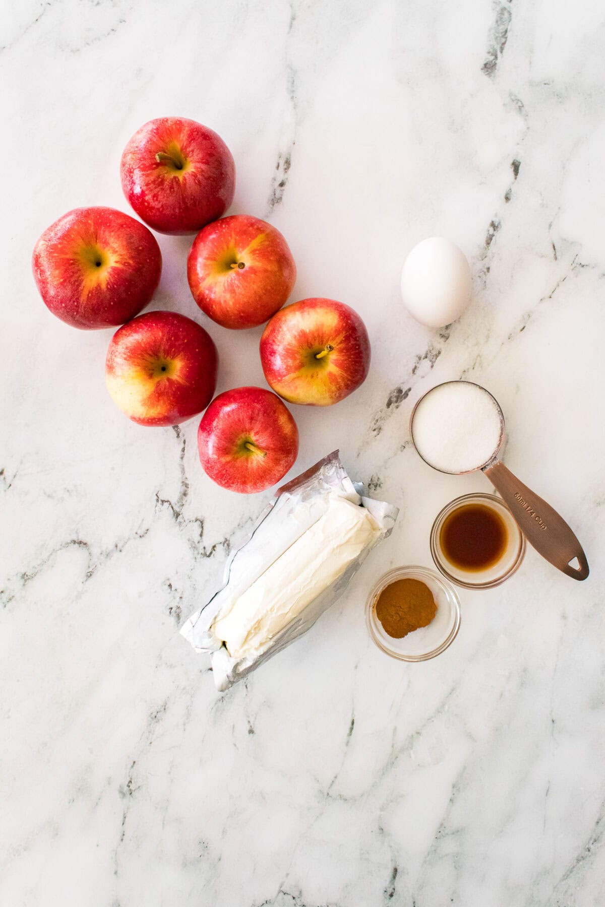 overhead shot of ingredients to make stuffed apples with cheesecake filling