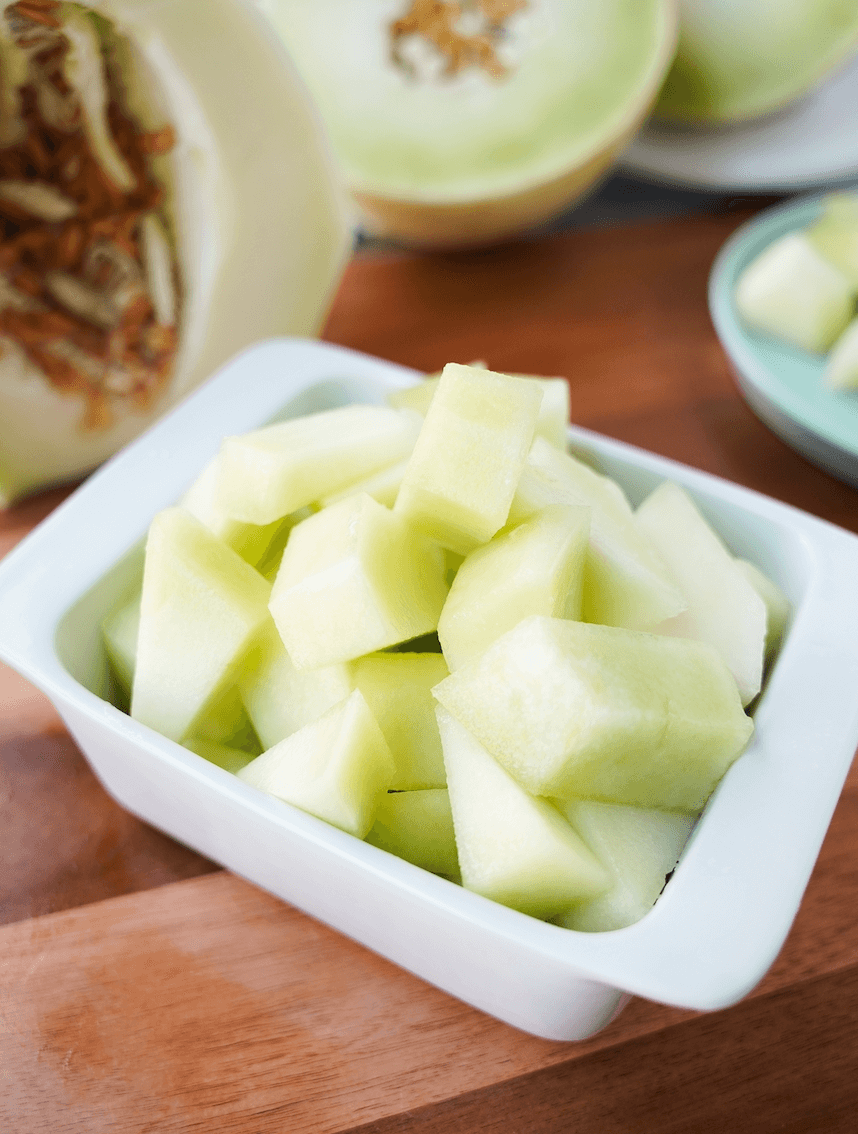 Cut Honeydew Melon in white dish
