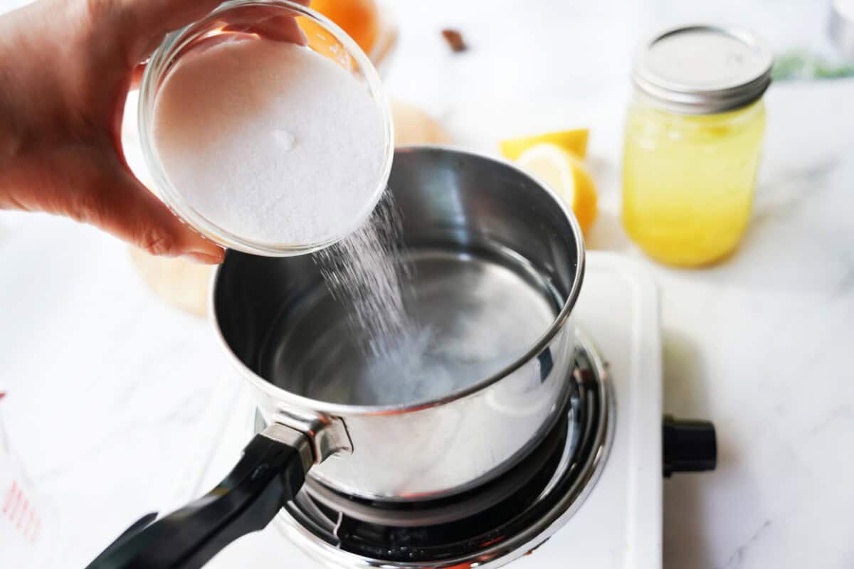 Sugar and water on the stovetop.
