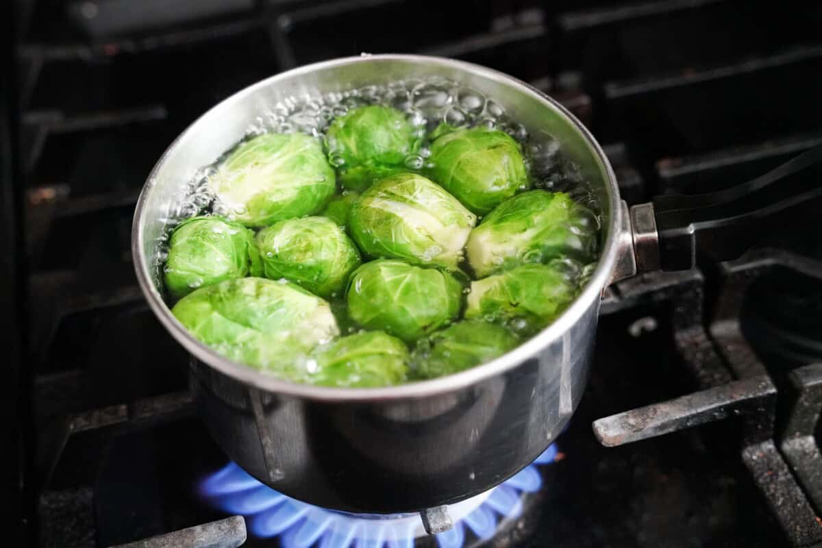 Brussels sprouts in a pan on the stove