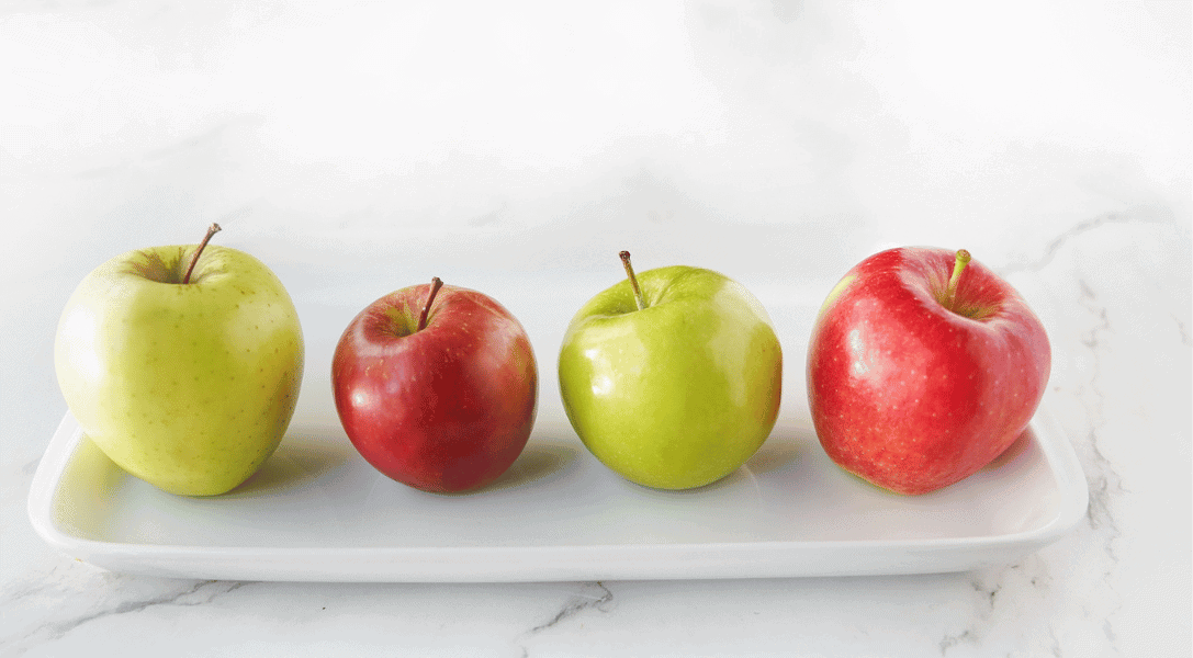 Apples on a white plate