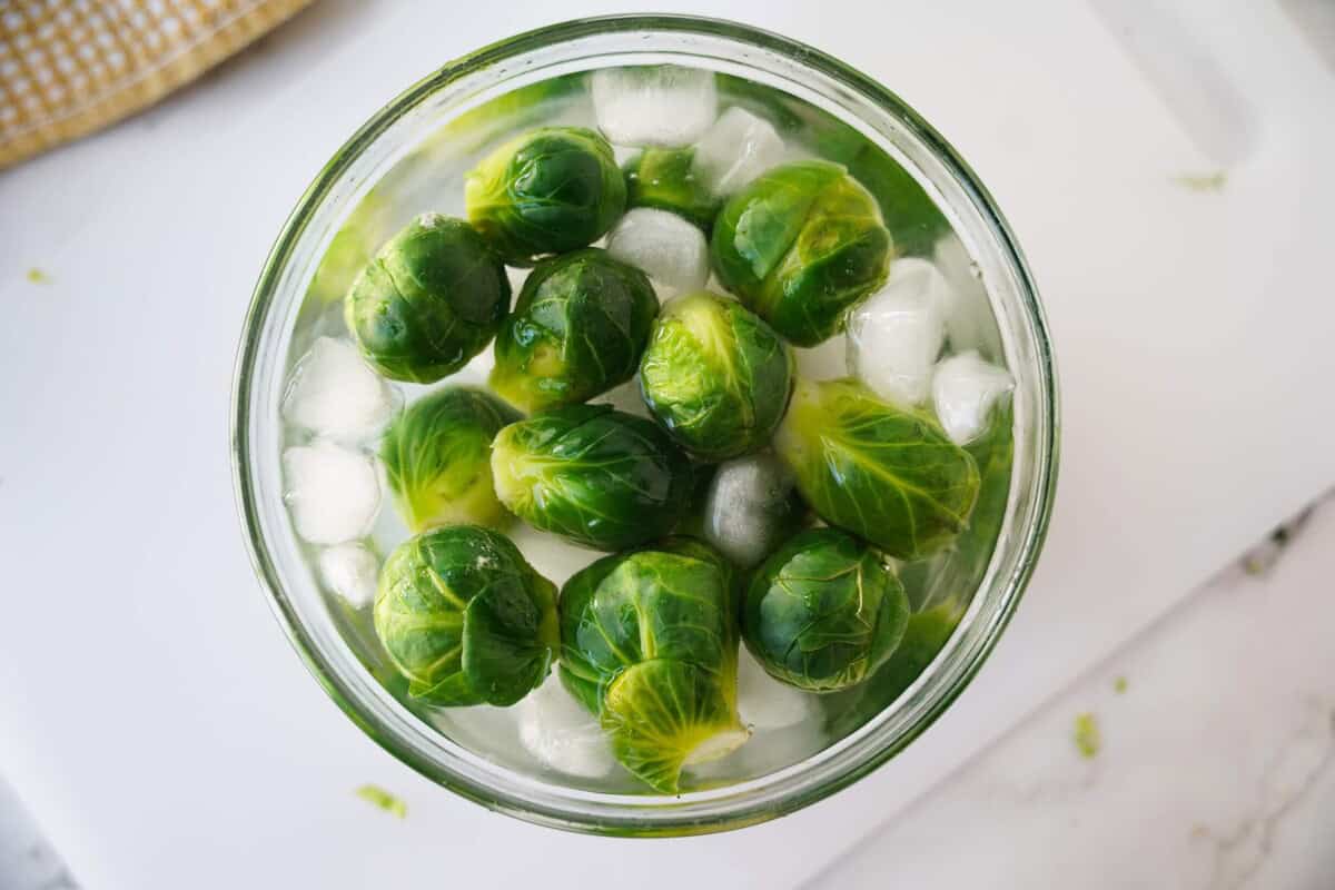 Brussels sprouts in an ice bath