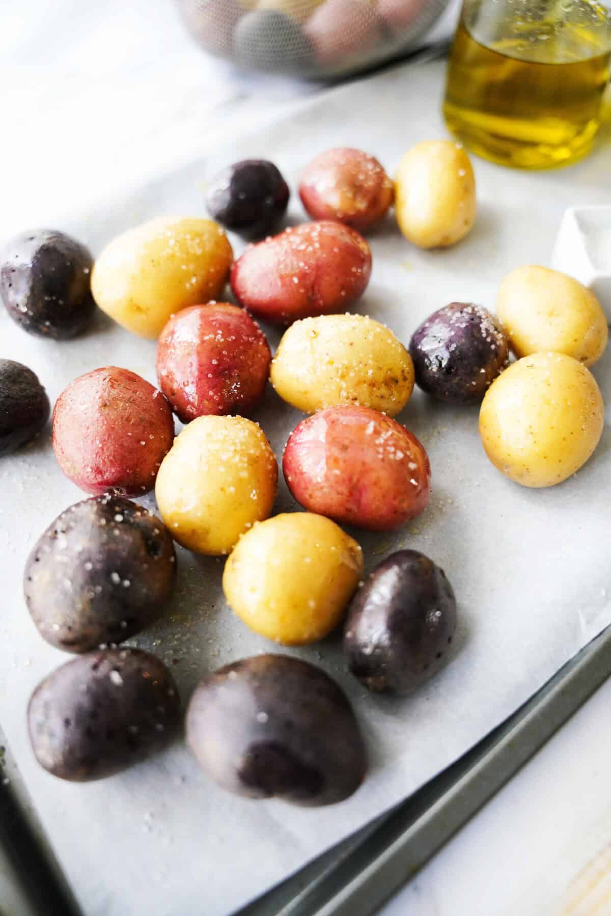Oiled and salted mini potatoes.