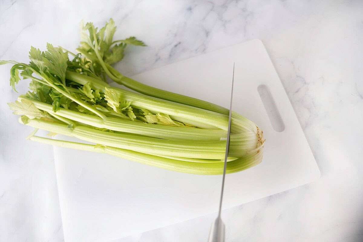 Cutting the root of the celery