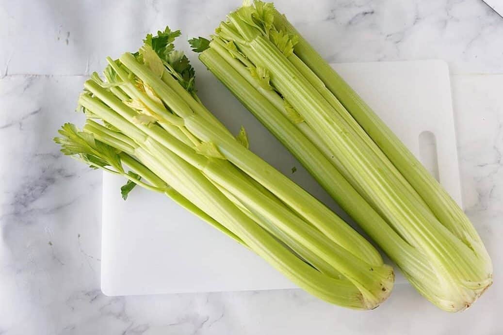 2 Celery Bunches on cutting board