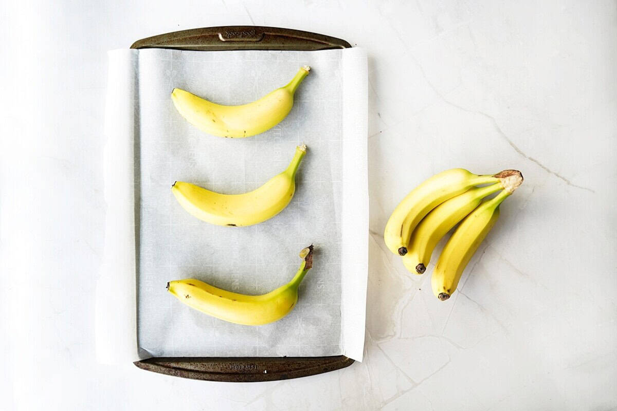 Overhead view of bananas on sheet pan
