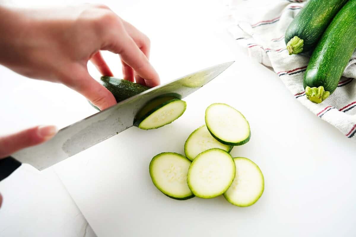 Cut Zucchini Bias on cutting board